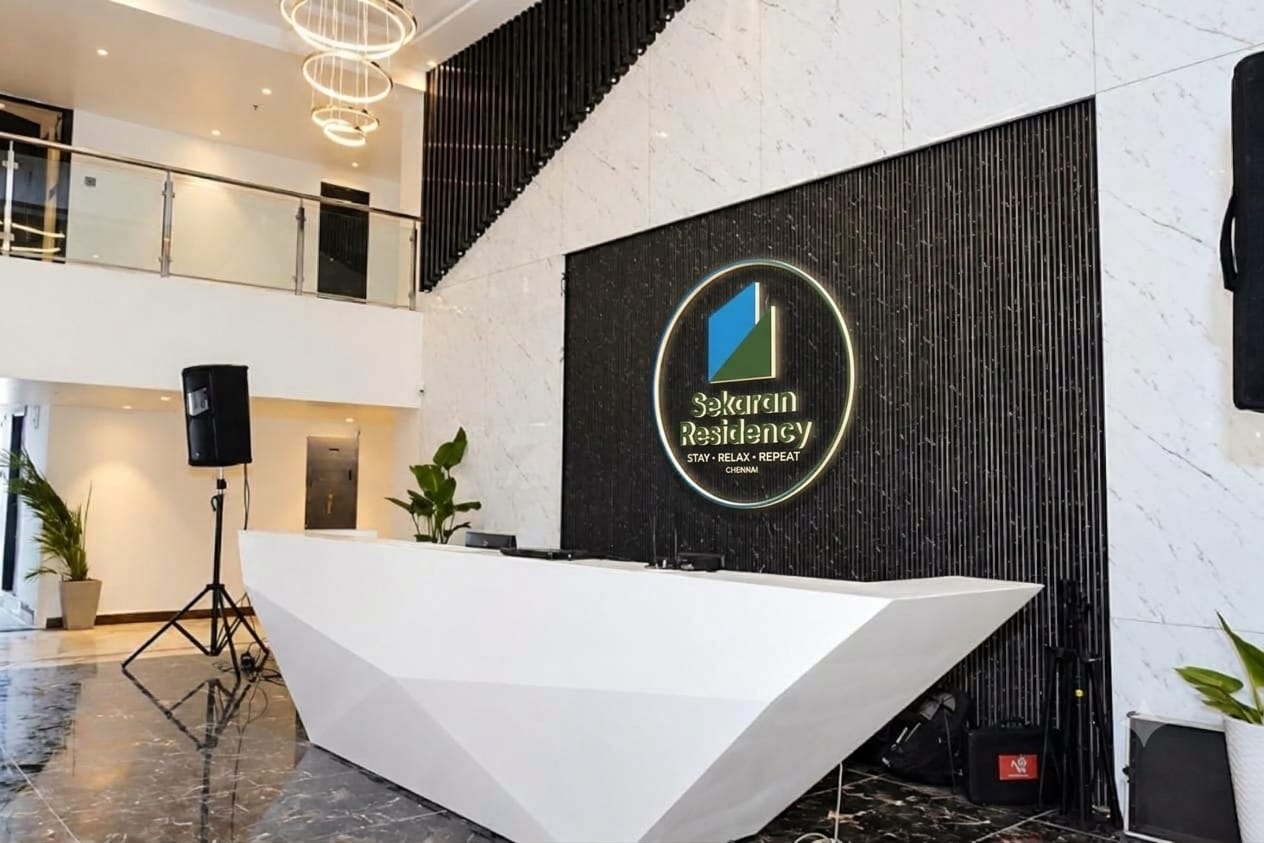 Reception at Sekaran Residency with the illuminated Sekaran Residency sign, Perumbakkam